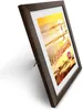 A framed picture of a California beach scene at sunset, displayed on a white background. Produktbild-Vorschau