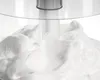 A close-up of whipped cream in a food processor bowl. Voir les images du produit