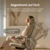 A woman sitting in an office chair, demonstrating its reclining features. Podgląd zdjęcia produktu