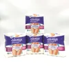 Four packages of Always Discreet incontinence underwear are stacked and arranged in a studio setting against a white background. Podgląd zdjęcia produktu