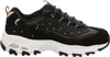 A side view of a black Skechers sneaker with white soles and rose gold accents. Voir les images du produit