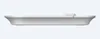 Side view of a white portable speaker on a light gray background. Voir les images du produit