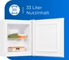 An open white freezer with food items inside, set against a blue background with text overlay. Produktbild-Vorschau
