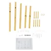 A collection of disassembled parts for a coat rack, including poles, screws, and an instruction manual, laid out on a white background. Produktbild-Vorschau