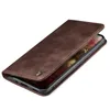 A brown flip case for a smartphone is shown on a white background. Produktbild-Vorschau