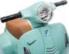 Close-up of the front of a child's electric Vespa scooter. Podgląd zdjęcia produktu