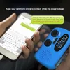 A person is holding a smartphone and a blue emergency radio. The smartphone screen displays a text message conversation. Produktbild-Vorschau