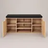 A shoe cabinet with a black seat on top, shown with its doors open. Náhľad obrázku produktu