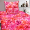 A close-up view of a bedding set with a floral pattern, featuring a pillow and a duvet cover. Produktbild-Vorschau