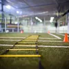 An indoor soccer training field with agility equipment. Náhled obrázku produktu