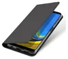 A black flip case for a smartphone, shown at an angle with the screen visible. Produktbild-Vorschau