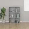 A bookshelf with various decorative items and books. Produktbild-Vorschau