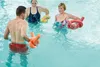 Three people are in a swimming pool, holding pool noodles for exercise. Produktbild-Vorschau