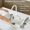A person is cleaning a meat grinder in a sink under a faucet. Produktbild-Vorschau