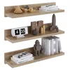 Three wooden shelves mounted on a white background, each displaying various decorative items and books. Produktbild-Vorschau