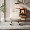 A cozy living room scene featuring a rocking chair, a plant, and a bookshelf. Náhľad obrázku produktu