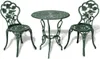 A green metal bistro set with a round table and two chairs, decorated with rose motifs, is displayed against a white background. Voir les images du produit