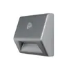 A close-up, studio shot of a gray LED battery-powered light fixture with a motion sensor. Voir les images du produit
