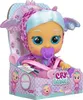 A Cry Babies doll named Bruny is shown in its packaging, which features a fantasy theme with scales and wings. Produktbild-Vorschau