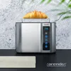 A stainless steel toaster with a croissant on top, placed on a black surface with a textured gray background. Produktbild-Vorschau