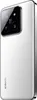 A white Xiaomi smartphone with a prominent camera module is shown from a diagonal angle against a white background. Podgląd zdjęcia produktu