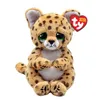 A plush toy cheetah with large green eyes and a Ty Beanie Babies tag. Voir les images du produit