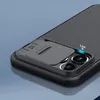 Close-up of a phone case's camera cover and lenses. Náhľad obrázku produktu