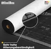 A roll of white material is shown diagonally across a dark gray background, with a magnified section highlighting the texture of a black material underneath. Markings and text are visible on the black material. Produktbild-Vorschau