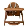 A brown toddler high chair is shown against a white background. Produktbild-Vorschau
