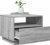 A gray wooden nightstand with an open drawer and a vase with a plant on top. Produktbild-Vorschau
