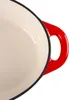 A close-up view of the handle and rim of a red and white enameled cast iron pot. Anteprima dell’immagine prodotto