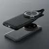 A black phone case with a magnetic ring and strap is shown floating above a smartphone. Produktbild-Vorschau