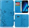 A blue flip case for a Samsung Galaxy A3 2017 phone, shown open and closed, with cards and currency inserted. Produktbild-Vorschau