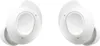A pair of white wireless earbuds is shown against a white background. Voir les images du produit