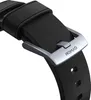 A close-up shot of a black watch strap with a silver buckle. Náhled obrázku produktu