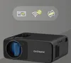 A black Overmax projector is shown in a studio setting with marketing icons above it. Voir les images du produit