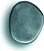 A close-up, top-down view of a single kitchen knife handle against a white and light gray background. Náhled obrázku produktu