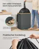 A person is demonstrating how to use a laundry hamper with a removable inner bag and a foot pedal. Produktbild-Vorschau