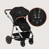 A black and silver Lionelo Amber 3-in-1 combi stroller is shown against a light gray background. A circular inset highlights the stroller's harness system. Produktbild-Vorschau