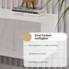 A white TV lowboard with books and a decorative object on top, with a marketing overlay detailing product features. Produktbild-Vorschau