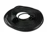 A coiled black extension cord with a plug and a socket. Podgląd zdjęcia produktu