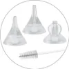 Three clear plastic funnel-like attachments and a cleaning brush are arranged in a circular frame. Anteprima dell’immagine prodotto