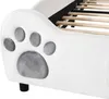 Close-up of a white bed frame with a paw print design. Produktbild-Vorschau