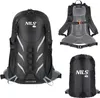 A product shot of a backpack and its rain cover, with a view of the backpack's back. Náhled obrázku produktu