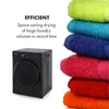 A black clothes dryer is shown next to a stack of colorful towels, with marketing text about its efficiency. Náhľad obrázku produktu