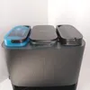 Three robot vacuum cleaner docking stations are lined up on top of a ribbed base. Produktbild-Vorschau