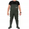 A person wearing waders and boots. Produktbild-Vorschau