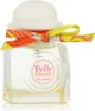 A bottle of Hermes Twilly Eau Ginger perfume with a decorative ribbon. Anteprima dell’immagine prodotto