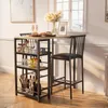 A bar table and stools set in a kitchen or dining area, with food and drinks on the table. Náhľad obrázku produktu