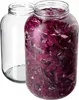 Two glass jars, one empty and one filled with chopped red cabbage. Podgląd zdjęcia produktu